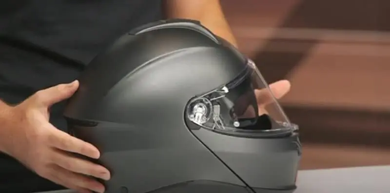 It weighs 1,620 grams (3.57 lbs) in its smallest shell size. I tested the XL size which came in at 1,950 grams (4.3 lbs).