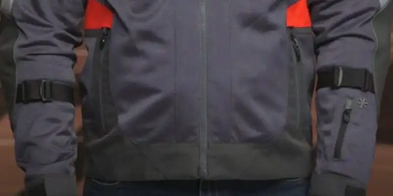 The Klim Induction jacket has a boxy, relaxed cut with no tapering in the torso or sleeves. If you’re not wearing an airbag vest, go down one alpha size for a better fit.