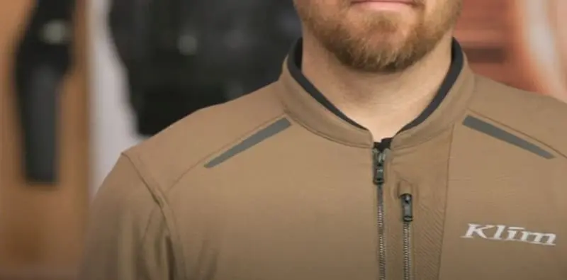 The outer shell is made of 1000D Karbonite Micromesh Cordura fabric. This stretchy woven material fits close and moves with me, making it comfortable riding gear for long days.